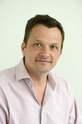 a portrait photograph of Marcus Munafo